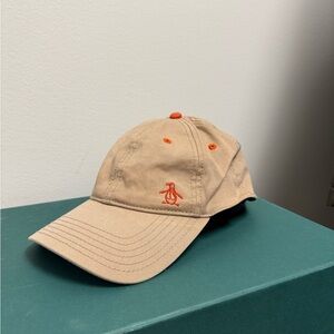 Source Unknown Tan and Orange Cap